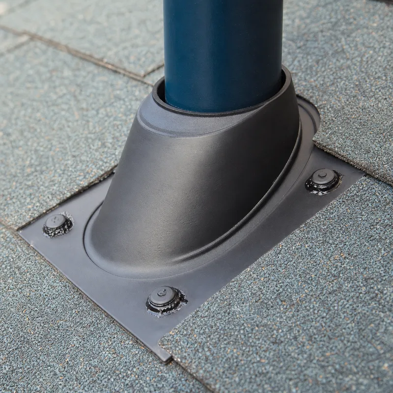 Correct roof flashing detail at a vent penetration with a new boot and properly seated roofing material